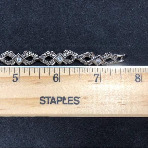 BRACELET - SILVER-TONE WITH 7 RHINESTONES EACH SET IN A SQUARE SETTING - Picture 16 of 16